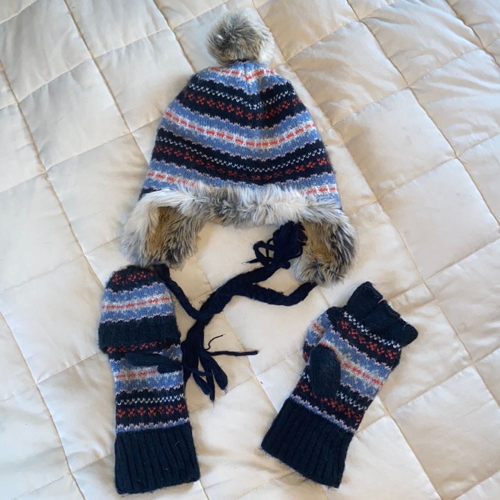 Aerie hat and mitten set. Navy, blue, white and orange design.